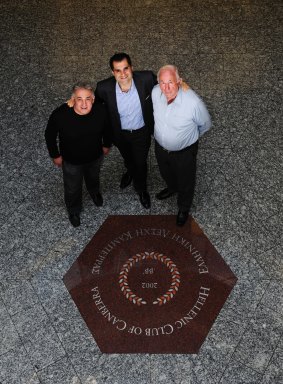 Centre, John Kalokerinos, president of the Hellenic Club in Woden, with foundation members from left, Michael George, a former president, and Alex Diamond. 