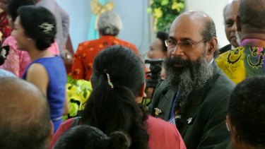Filep Karma at his daughter's wedding reception in Jayapura. He was returned to jail immediately after the event.