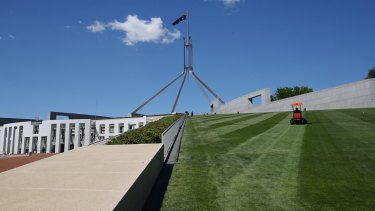 Instead of a berm or moat, a new fence will cut across the lawns at Parliament House.
