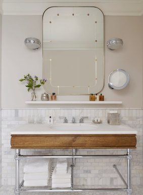 The spacious Carrara marble bathroom features toiletries by Brooklyn-based perfumer D.S. and Durga.