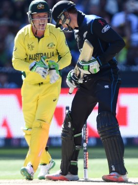 Brad Haddin celebrates the wicket of Martin Guptill.