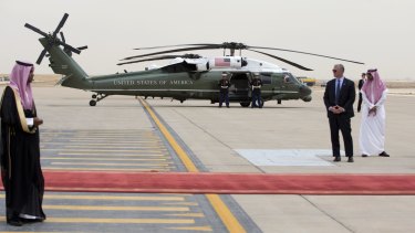 A rockier road: Marine One is staged on the tarmac as President Barack Obama arrives on Air Force One at King Khalid International Airport in Riyadh.
