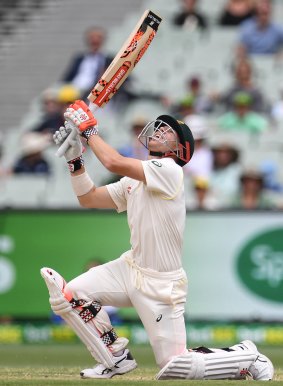 Ugly trajectory: Warner follows the ball before it is caught  by James Vince.