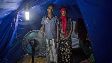 Rohingya refugees Syaifullah, 22 and his wife Yasminara Begum, 18, at a temporary shelter in Bayeun.