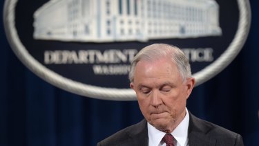 Attorney General Jeff Sessions pauses during a news conference.