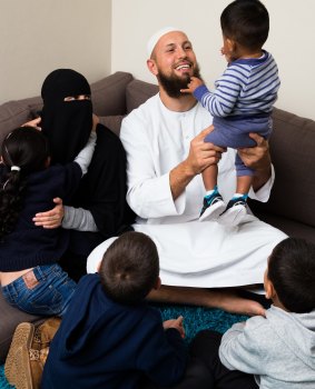 Foster carers Samah Al-Ali and Zak Jamus with their four foster children.