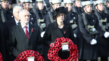 Jeremy Corbyn and Theresa May attend the 2016 Remembrance Sunday Service at the Cenotaph on Whitehall.
