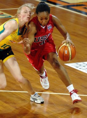Cappie Pondexter rounds Australian Opals' Samantha Richards back in 2006.