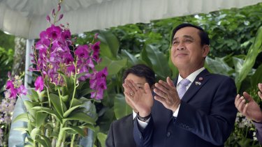Thailand's Prime Minister Prayuth Chan-ocha attends a ceremony at Singapore's national orchid garden to name an orchid hybrid after him.