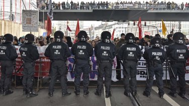 Police secure the streets during a counter demonstration against far-right groups  in Cologne on Sunday.