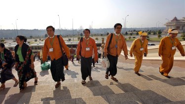 Myanmar lawmakers arrive to attend the final session of Myanmar's parliament as it ends its five-year term on Friday, January 29.
