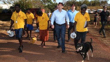 Prime Minister Tony Abbott with school attendance officers in Yirrkala during his visit to North East Arnhem Land in 2014.