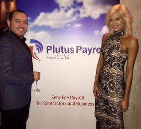 Simon Anquetil poses with former Miss World Australia Erin Holland at a Plutus Payroll event.