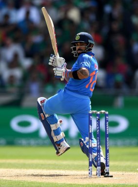 Captain's knock: Virat Kohli crunched an unbeaten 96 off 78 balls against Bangladesh to guide India into the Champions Trophy final.