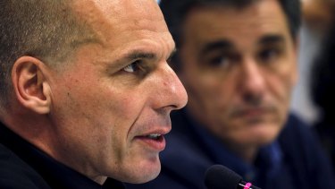 Newly-appointed Finance Minister Euclid Tsakalotos (right) and outgoing Yannis Varoufakis address a news conference during a handover ceremony in Athens, Greece.