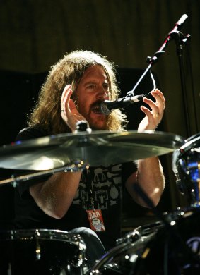 Kram plays with the band in 2008. 