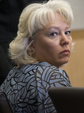 Debra Milke looks around the court room during a hearing on Monday in Phoenix, Arizona. Judge Rosa Mroz dismissed the murder charges and ordered a probation officer remove a monitoring device from her ankle. 