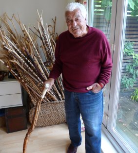 Chef and restaurateur Antonio Carluccio, with his collection of walking sticks he has carved from hazel branches, something he's done all of his life. Each includes a mushroom carved into the top.