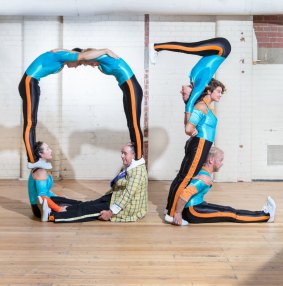 Circus Oz performers spell out a birthday message at the company's headquarters in Melbourne.