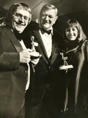 Gold Logie winners, Denise Drysdale and Ernie Sigley with John Wayne on March 8, 1975.