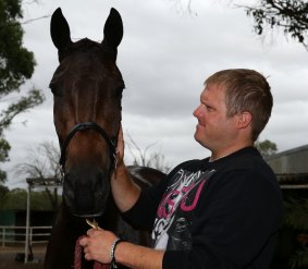To the rescue: Keinbah harness racing trainer Shane Tritton.