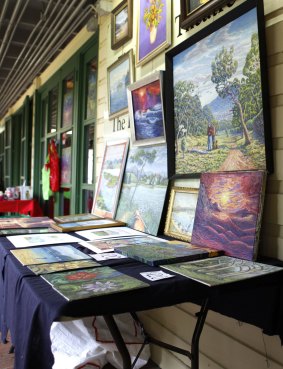 Paintings on sale at the markets in 2012.
