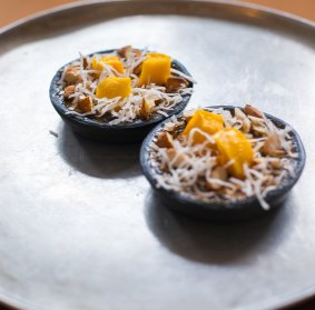 Sweet treat: Black sticky rice mango pudding tarts with mint and lime-infused custard wow customers with a distinctive south-east Asian twist at Nora.