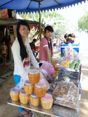 Khymer villagers sell palm sugar