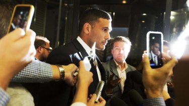 Relieved: Brisbane captain Justin Hodges leaves the NRL judiciary on Tuesday night after being cleared of a lifting tackle.