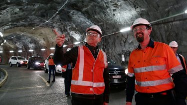 Prime Minister Malcolm Turnbull with Upper Tumut Area Manager Kent Allen, during his tour of the Snowy Hydro Tumut 2 power station on Monday.