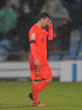 Lionel Messi and his Barcelona teammates were forced to settle for a 0-0 draw on a wet day against Getafe.