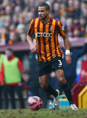 Bantam wait: James Meredith pauses with the ball for Bradford City.