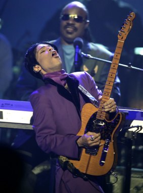 Prince, joined by Stevie Wonder, performs during the BET Awards earlier this year.