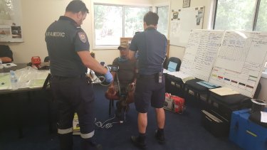 Paramedics checked Mr Ascui over after his rescue.