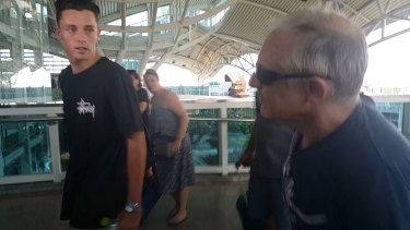 Jamie Murphy and his father Brendan arrive at Denpasar International Airport.