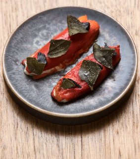 Piquillo peppers with goat's cheese, black garlic.