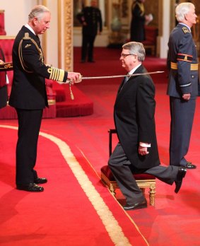 Lynton Crosby, David Cameron's general election campaign director, is made a Knight Bachelor of the British Empire by the Prince of Wales in 2016.