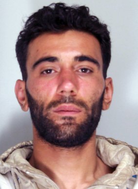 Italian police's mugshot of Mohammad Ali Malek.