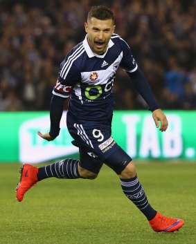 Kosta Barbarouses celebrates a goal for Melbourne Victory.