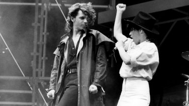 INXS singer Michael Hutchence duets with Jenny Morris at the Countdown Music and Video Awards at the Sydney Entertainment Centre in December, 1986.