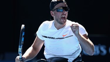 You beauty: Dylan Alcott celebrates his quad wheelchair singles title in Melbourne. 
