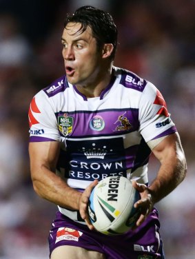 Cooper Cronk gets ready to pass during the match against Manly.
