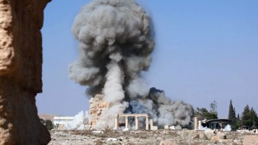 Smoke from the detonation of a 2000-year-old temple in Palmyra.The image was released on an IS social media account.