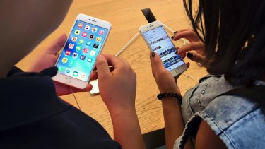 Staff at a Brisbane Apple Store reportedly lifted photos from some customers' iPhones and took more than 100 photos of female customers and staff.
