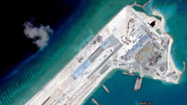 Reclamation: A satellite image taken in April shows a Chinese airstrip under construction on Fiery Cross Reef in the South China Sea.