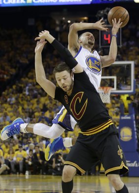 Defensive duties: Matthew Dellavedova blocks State Warriors guard Stephen Curry in game five of the NBA finals series.