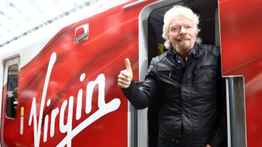 Sir Richard Branson on board a Virgin Azuma high-speed train.