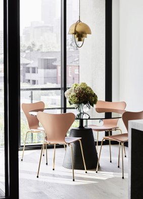 One solution is cantilevered chairs, while another is a pedestal-based table.