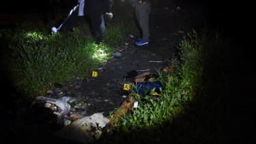 The body of one of the alleged drug dealers in Manila, Philippines. 