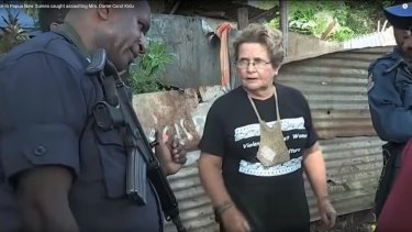 Dame Carol Kidu argues the point with police at Paga Hill in May 2012, as seen in <i>The Opposition</i>.